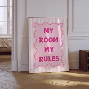 May include: Pink and white striped poster with the text "My Room My Rules" in a pink wavy frame.