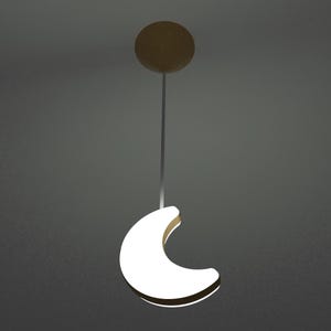 Peut inclure: Un luminaire suspendu en forme de croissant de lune blanc suspendu à un luminaire de plafond brun.