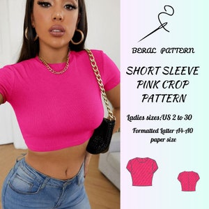 Puede incluir: Un patrón de costura para un top corto rosa de manga corta. El patrón es para tallas de mujer españolas 34 a 52 y está formateado para papel A4-A0.