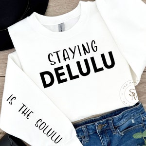 Staying Delulu Is The Solulu SVG and PNG File Download, Cute Trendy Fun Manifesting Design for Shirts, Sweatshirts, Mugs Tote Bags etc.