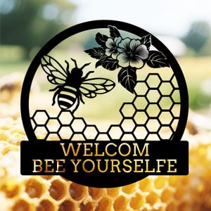 May include: Black metal welcome sign with a bee, honeycomb, and flowers. The sign reads "Welcome Bee Yourself".