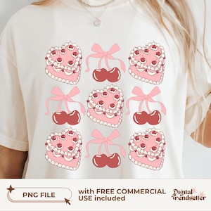 May include: A white t-shirt with a pink and red graphic design of heart-shaped cakes with cherries. The text "PNG FILE" and "with FREE COMMERCIAL USE included" is printed on the bottom of the shirt.