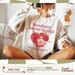 COQUETTE STRAWBERRY RIBBON OVERSIZED GRAPHIC TEE