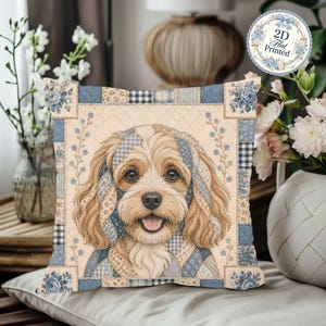 May include: A square throw pillow featuring a central woven portrait of a light brown dog with floppy ears. The pillow has a quilted-style border with blue and white floral and checkered patterns. A circular sticker in the corner reads 2D Flat Printed.