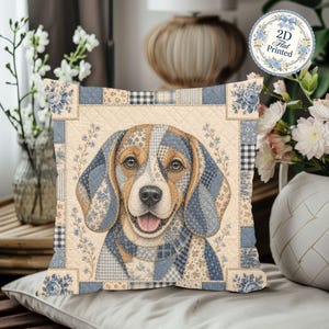 May include: A square throw pillow featuring a central illustration of a beagle dog composed of blue and beige patchwork patterns. The pillow has a quilted border with floral and checkered motifs in shades of blue and cream. A circular tag reads 2D Flat Printed.