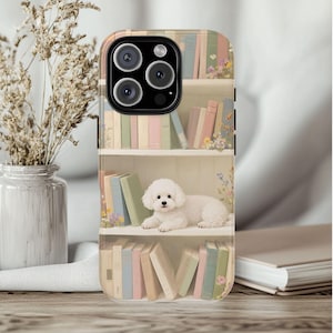 May include: A phone case featuring a whimsical design of a bookshelf with colorful books and a fluffy white dog. The case has a glossy finish and a protective design, perfect for a smartphone.