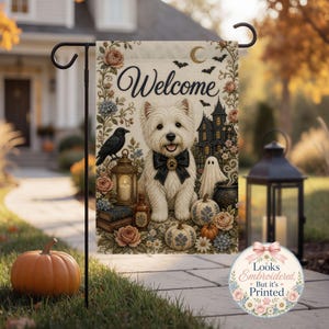 May include: A rectangular garden flag featuring a white Westie dog wearing a black bow tie, surrounded by roses, a crow, a lantern, a haunted house, a ghost, and pumpkins. The text Welcome is at the top. A circular badge states Looks Embroidered, But it's Printed.
