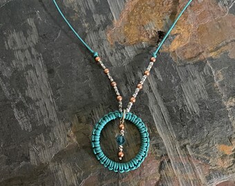 WOVEN LEATHER CIRCLE