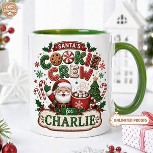 May include: A white ceramic mug with a green interior and handle, featuring a festive Christmas graphic of Santa Claus, a red mug of hot cocoa, candy canes, and a tree. The text reads Santa's Cookie Crew for CHARLIE in red and green lettering.