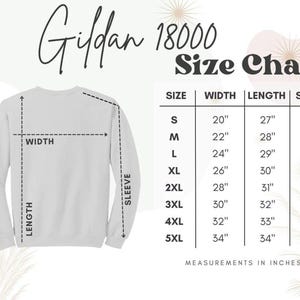May include: A white Gildan 18000 sweatshirt with a size chart. The chart lists sizes S to 5XL, with measurements in inches for width, length, and sleeve length. The sweatshirt is shown with dotted lines indicating width, length, and sleeve measurements.