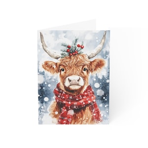 Adorable carte de Noël vache Highland, voeux de vacances rustiques avec écharpe rouge festive, parfaite pour les amoureux des animaux de la ferme et les souhaits d'hiver