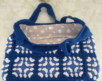 Natural and Stylish Woven Bag Product Description: This handmade woven bag is crafted from natural and sustainable materials. 100% cotton
