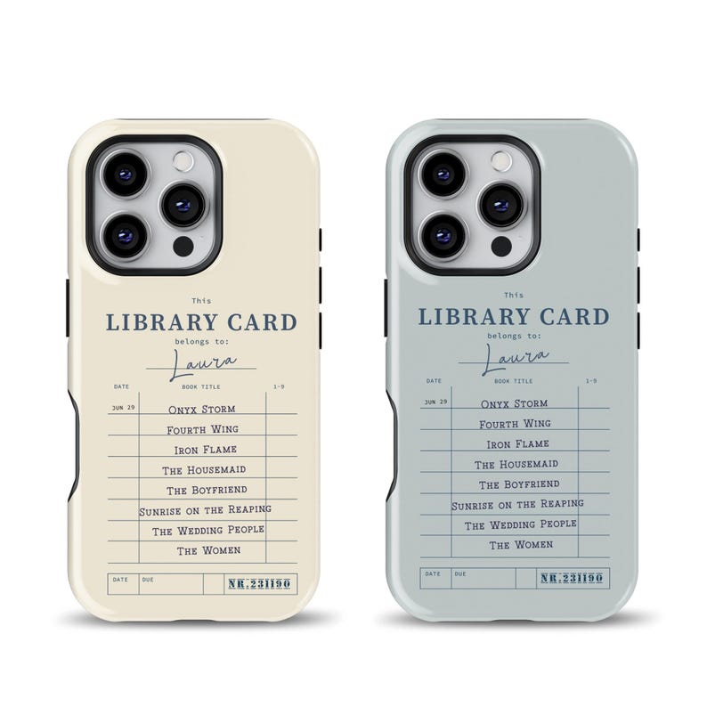 May include: Two phone cases with a vintage library card design. One case is cream-colored, the other is light blue. Both cases feature the text "LIBRARY CARD" and a list of book titles. The name "Laura" is handwritten on each case.