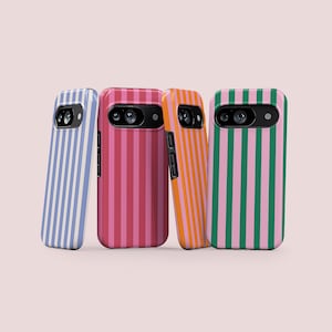 May include: Four smartphone cases featuring vertical stripes in various color combinations including light blue and white, dark pink and light pink, orange and light orange, and green and pink. Each case has a black camera cutout area.