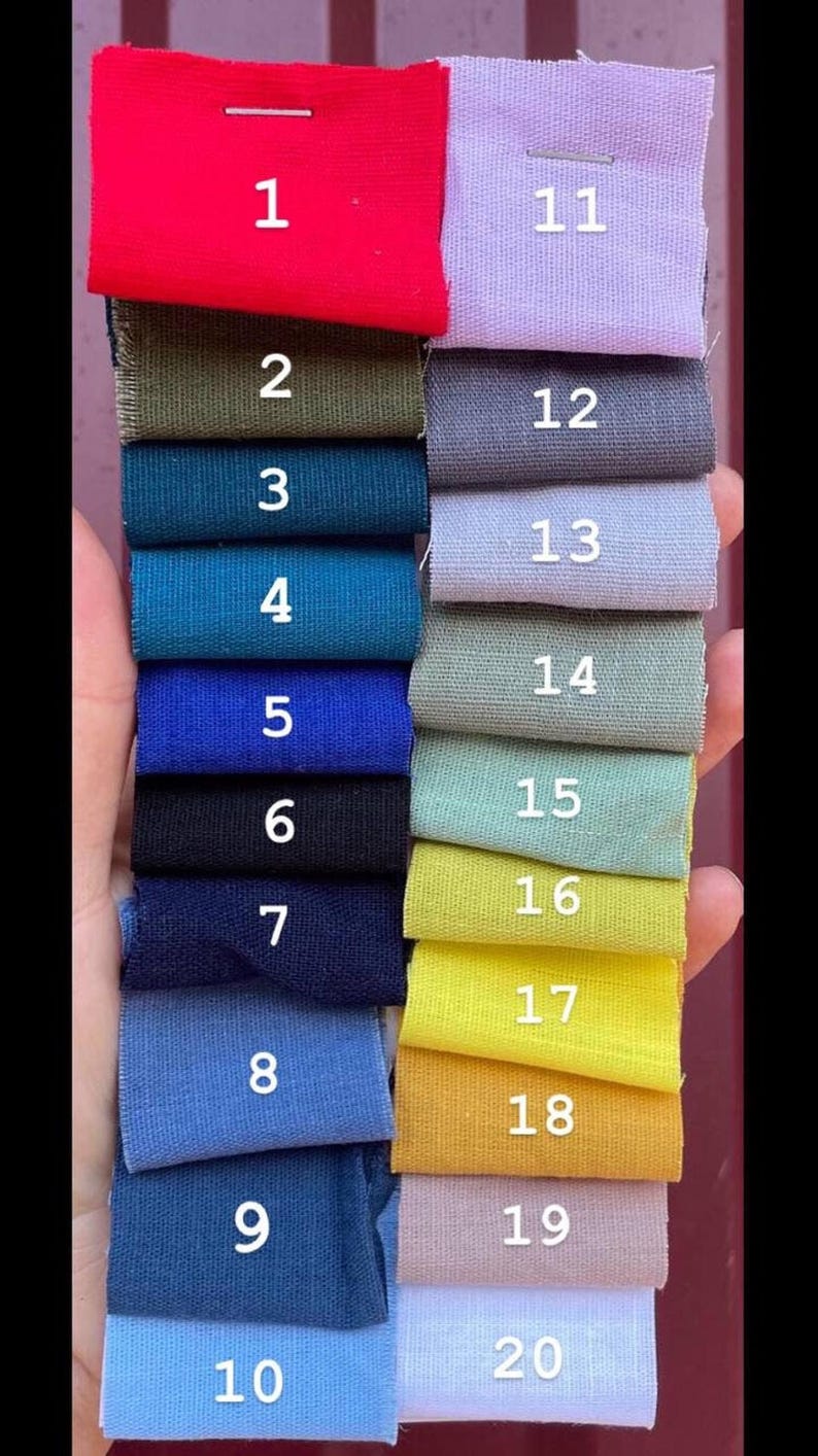 Twenty numbered swatches of fabric in various colors, including red, green, blue, yellow, and purple, are arranged in rows.