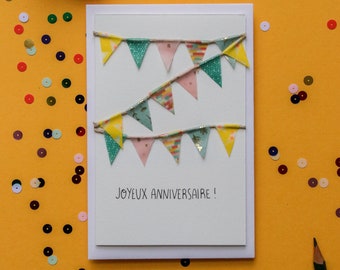 Carte postale double, message "Joyeux anniversaire", fanions en masking tape rose, vert et jaune