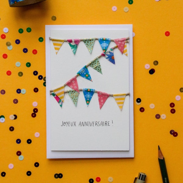 Carte postale double, message "Joyeux anniversaire", fanions en masking tape jaune, rose et bleu