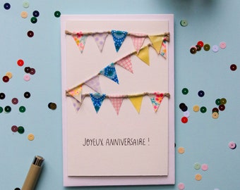 Carte postale double, message "Joyeux anniversaire", fanions en masking tape rose, jaune et bleu