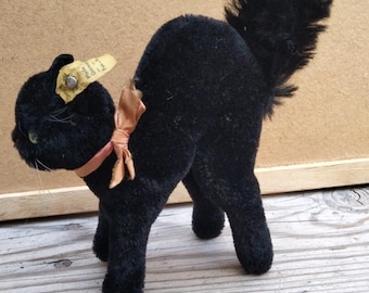 Small black German stuffed cat with tag 1962