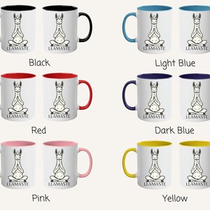 May include: Set of two ceramic mugs with a white background and a black outline of a llama doing yoga. The mugs have a contrasting color rim and handle. The text "LLAMASTE" is printed on the mug. The colors available are black, light blue, red, dark blue, pink, and yellow.