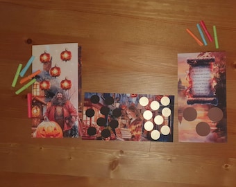 May include: Three illustrated cards featuring characters and scenes from a fantasy series, with circular cutouts. One card depicts a man with a pumpkin, another shows a woman in a shop, and the third has text. Several colorful markers are scattered around.