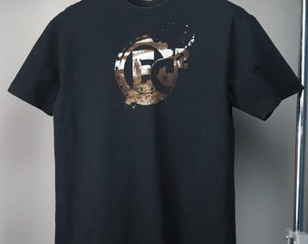 Vintage 2000s Far Cry 2 PS3 Ubisoft Game Black Crewneck Tee With Graphic Print • Vintage Gaming Black T Shirt • All Over Print Big Logo Tee