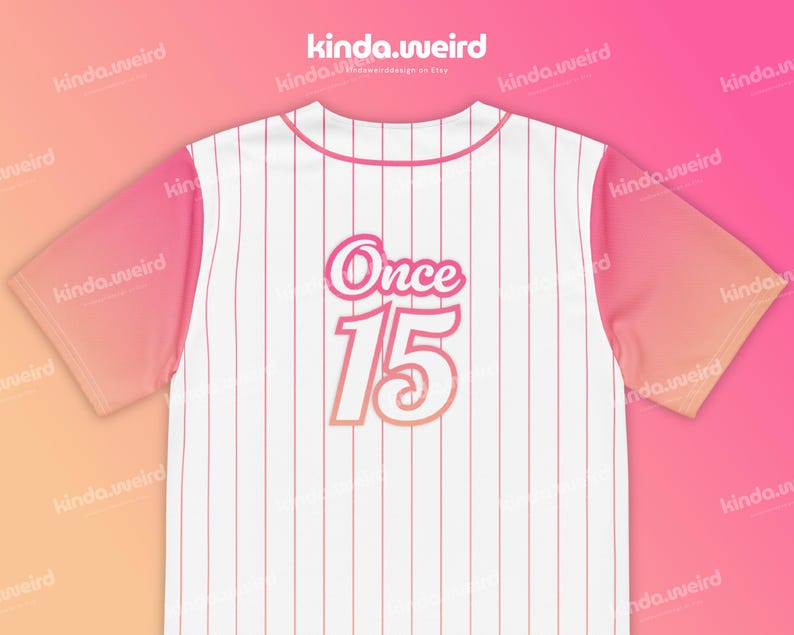 May include: White baseball jersey with pink stripes and a pink gradient on the sleeves. The back of the jersey has the text "Once 15" in a pink and orange gradient.
