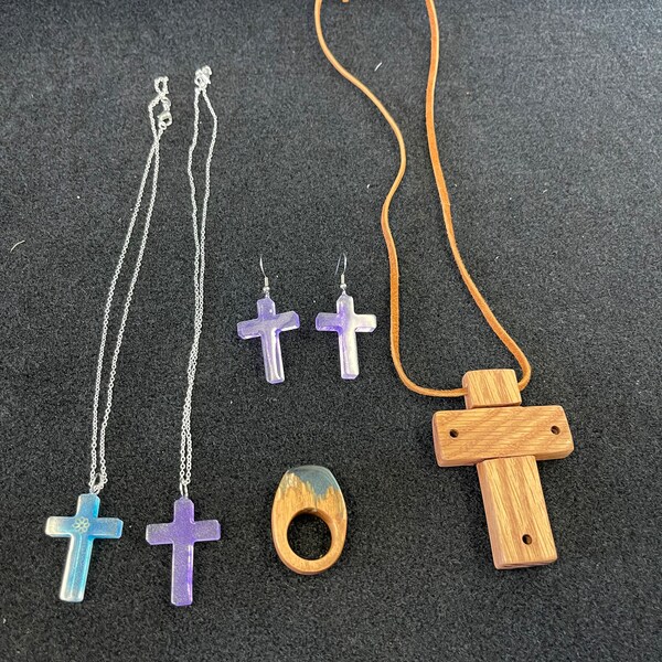 Wood cross adjustable leather strap necklace, wood and resin ring, resin earrings, and a resin cross necklace. Handmade.