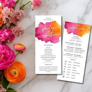 May include: A wedding invitation suite with pink and orange floral accents. Two white cards display the wedding details, including the names "Penelope + Sebastian" and the wedding party information.