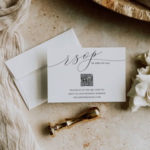 May include: A white RSVP card with a black and white QR code. The text on the card reads "rsop by April 1st 2024" and "Please scan the QR code to RSVP via our wedding website deliawedshadle.com".
