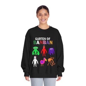May include: Black sweatshirt with a white graphic print of the text "Garten of Banban" and colorful cartoon characters.