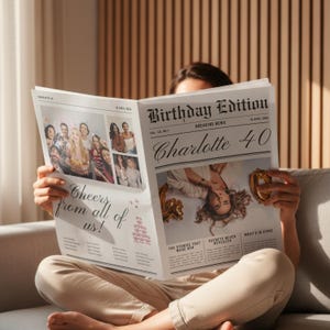 May include: A person holding a newspaper titled "Birthday Edition" with the headline "Charlotte 40." The newspaper features photos and the text "Cheers from all of us!" and "Secrets never revealed."