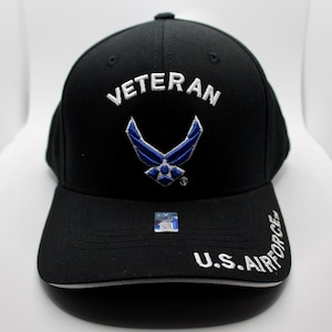 May include: Black baseball cap with a white "Veteran" embroidered on the front, a blue Air Force logo, and "U.S. Air Force" embroidered on the back.