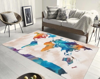 May include: A colorful world map rug with a white background and blue, orange, red, and purple watercolor accents. The rug is laid out on a light wood floor.
