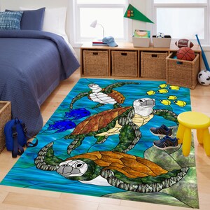 May include: A stained glass style rug featuring four sea turtles swimming in a blue ocean with yellow fish. The turtles are brown, green, and white with detailed shell patterns.
