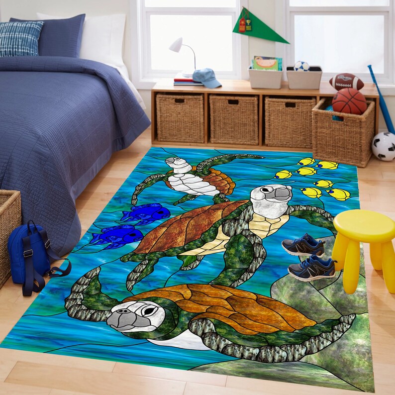 May include: A stained glass style rug featuring four sea turtles swimming in a blue ocean with yellow fish. The turtles are brown, green, and white with detailed shell patterns.