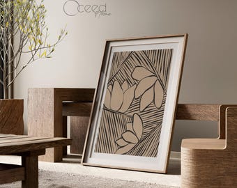 May include: A framed art print featuring a beige floral design with black line details. The artwork is displayed in a light brown wooden frame, leaning against a wooden bench. The print is part of a home decor collection.