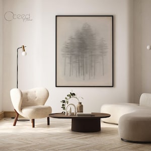 May include: A living room interior with a white couch, a white armchair, a round wooden coffee table, two floor lamps, and a framed black and white print of a forest scene.