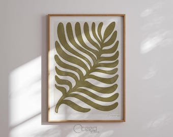 May include: A framed print of a stylized green leaf with a white background. The print is titled "Canary".