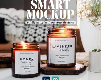 May include: Two amber glass candle jars with labels. The larger jar is labeled "LAVENDER + vanilla" and is a 9 ounce candle mockup. The smaller jar is labeled "HONEY + coconut" and is a 4 ounce candle mockup. Both jars are on a wooden coaster.