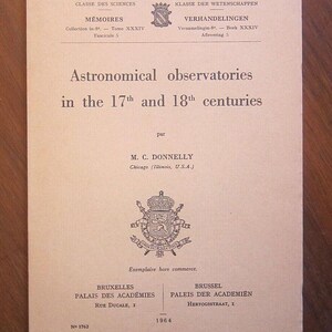 May include: A black and white image of a book cover with the title "Astronomical observatories in the 17th and 18th centuries" by M. C. Donnelly. The cover also includes the text "Académie royale de Belgique" and "Koninklijke Academie van België".