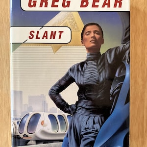 May include: A book cover with a blue and white futuristic cityscape, a woman in a blue dress, and the title "GREG BEAR SLANT" in red and white text. The quote "A cohesive and original vision of the future." is attributed to People magazine.