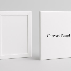 Op de afbeelding: Twee witte canvaspanelen worden getoond tegen een lichtgrijze achtergrond. E&eacute;n paneel is ingelijst, de andere is een eenvoudige rechthoek. De woorden "Canvas Panel" staan op het rechthoekige paneel.
