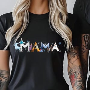 A woman with long blonde hair and a man wearing a black t-shirt with the word "Dada" printed on it.