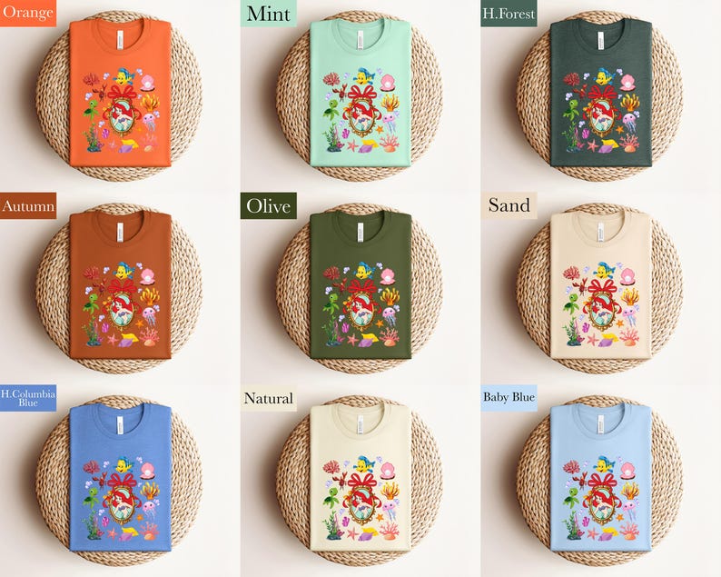 The image is a collage of nine different t-shirt designs, each with a unique color and pattern. The t-shirts are displayed on a woven basket, and the colors include orange, mint, green, olive, sand, blue, natural, and baby blue.