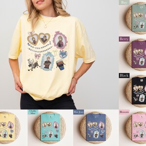 A woman wearing a yellow t-shirt with various cartoon-style illustrations and text, including a heart, a cup, and other whimsical designs.
