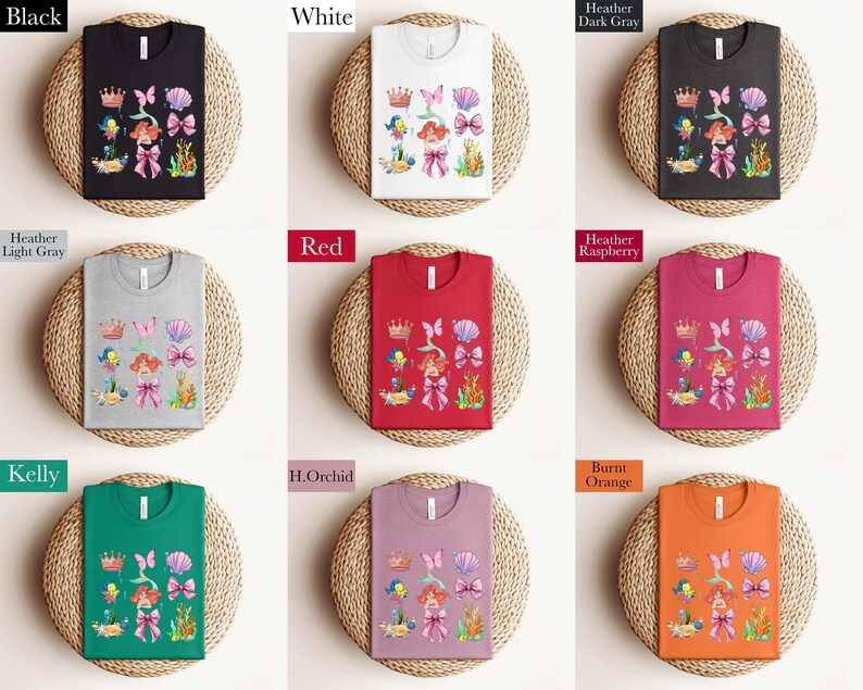 a collection of t-shirts with various colors and designs, including floral patterns and crowns, arranged in a grid-like pattern.