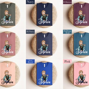 The image is a collage of nine t-shirts, each featuring a different color and design, with the name "Sophia" printed on them.