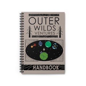 May include: A tan spiral bound notebook with a black and white illustration of a space scene. The text "Outer Wilds Ventures Handbook" is printed on the cover.