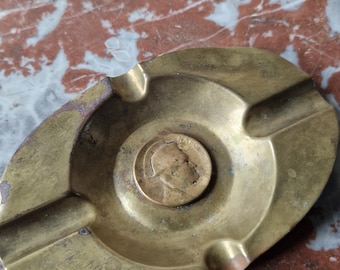 Antique French Brass ashtray with Napoleon motif.